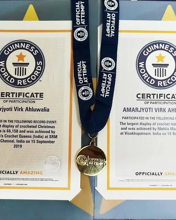 I am a proud multiple Guinness World Record holder for my participation in creating the largest displays of crochet items. This is a big part of my journey from a homemaker to a professional crochet artist.