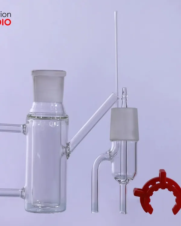A disassembled view of a complex glass instrument. We shoot components separately to clearly show how they fit together.