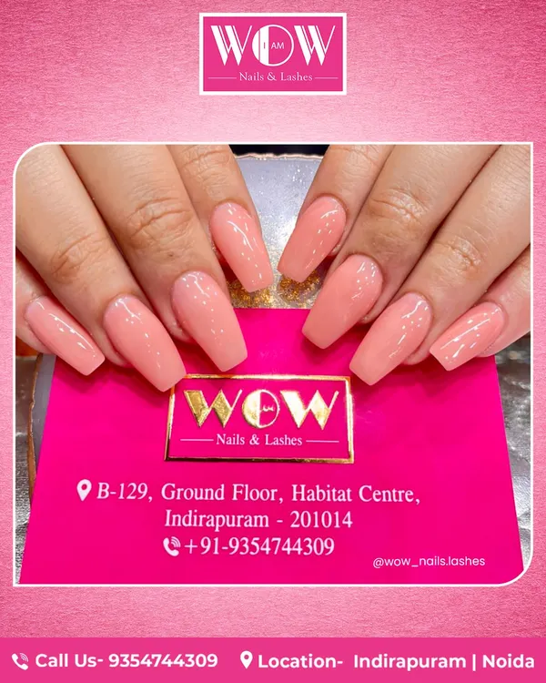 These perfectly sculpted, long coffin nails in a soft peach nude are a statement of simple elegance. Our acrylic extensions provide the perfect canvas for a flawless, single-color manicure that lasts.