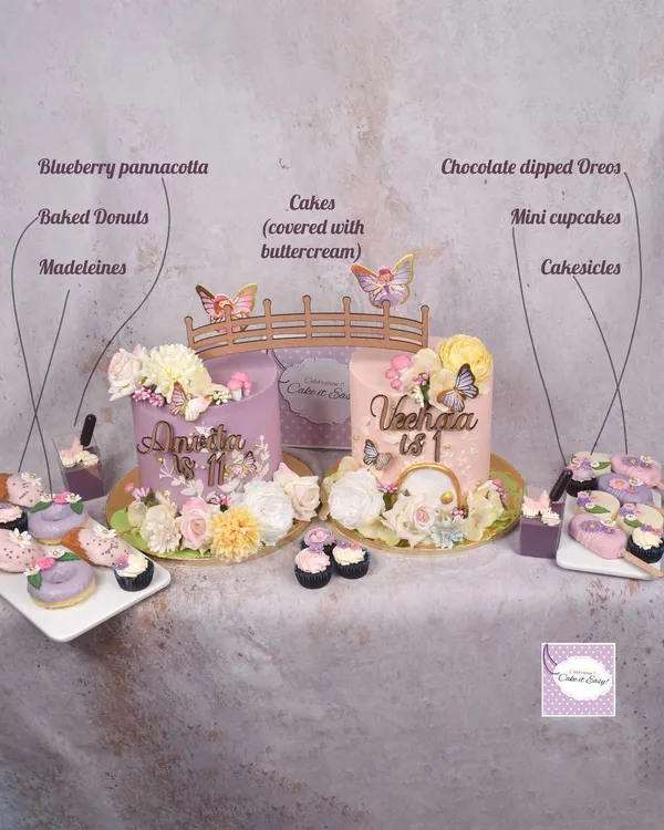 This fairy garden dessert table is the perfect example of what I mean by "more than just cake." We created two main cakes for the birthday girls and surrounded them with a whole spread of themed treats, including blueberry pannacotta, baked donuts, madeleines, mini cupcakes, cakesicles, and chocolate-dipped Oreos.