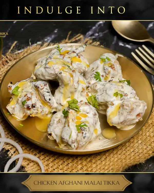 Indulge in our deliciously creamy Chicken Afghani Malai Tikka. Tender chicken pieces marinated in a rich blend of cream, cashews, and mild spices, then grilled to perfection.