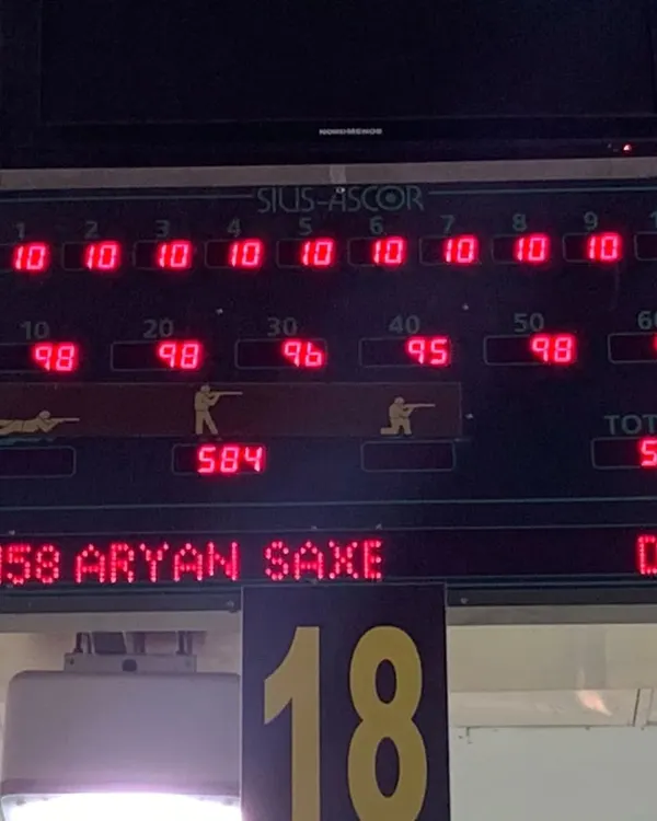 A fantastic score of 584/600 by Aryan Saxena in the selection trials, displayed on the electronic scoreboard.