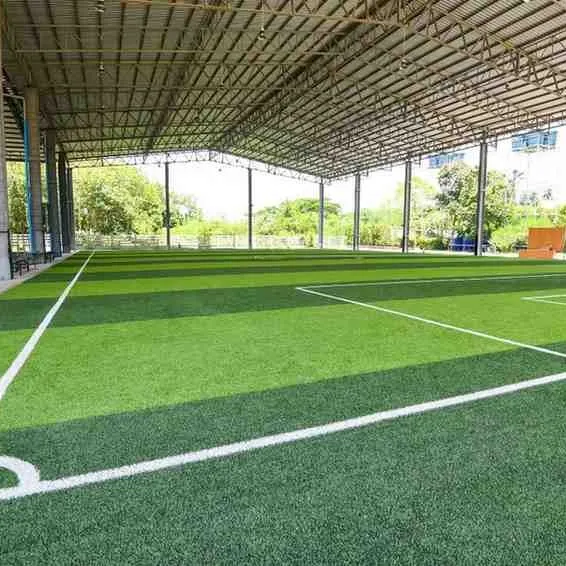 This covered football pitch is one of our flagship projects, demonstrating our ability to deliver large-scale, all-weather sports solutions. The turf is engineered for consistent ball roll and player comfort.