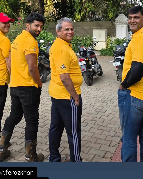 Our crew in uniform yellow polo shirts, ready for a Sunday ride. This sense of unity is what makes our group motorcycle adventures special.