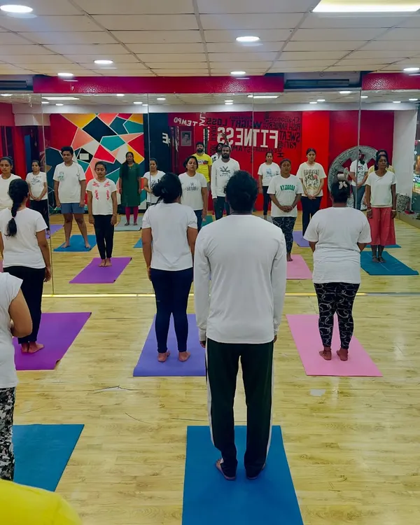 We start our yoga sessions with Tadasana (Mountain Pose) to center ourselves and focus on our breath before flowing through the asanas.