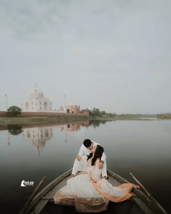 An intimate moment on the serene waters of the Yamuna, with the timeless Taj Mahal reflected below. This is the kind of eternal, romantic pre-wedding portrait I love to create.