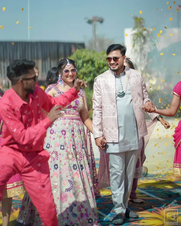 The grand entrance of the couple at their daytime Mehendi ceremony. I love capturing the energy of the moment, with friends and family dancing and celebrating alongside the bride and groom.