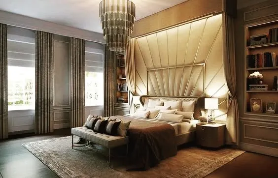 A masterclass in luxury bedroom design. This render showcases a floor-to-ceiling upholstered headboard, a stunning tiered chandelier, and integrated bookshelves, creating a space that feels like a suite in a five-star hotel.
