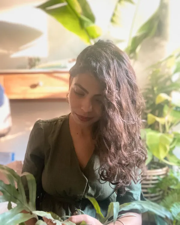 This is me, Deepika, in my element, surrounded by plants. Running ByTheLeaf is a journey of passion, from designing landscapes to packing orders, and I wouldn't have it any other way.