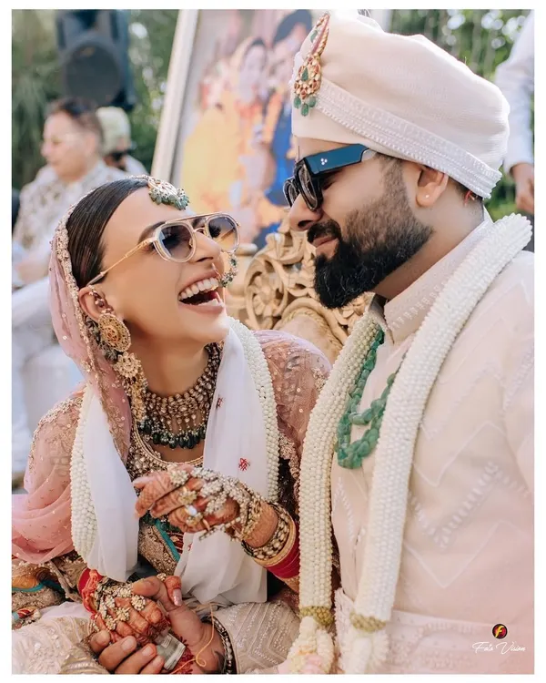 The best moments are the ones filled with laughter. We love capturing these candid interactions between the couple, like this joyful shot of Mehak and Tarun, which radiate pure happiness.