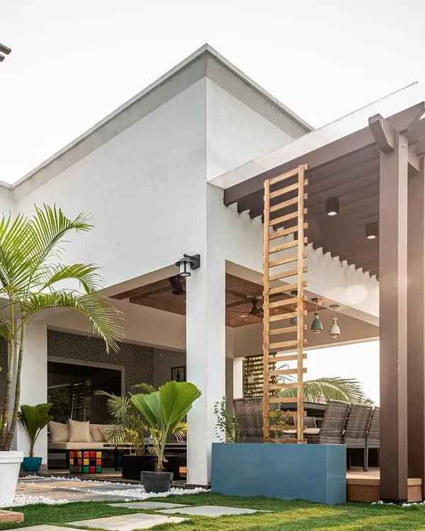A complete rooftop transformation, creating an expansive outdoor living room. This project features a large pergola, a vertical garden, and plenty of space for dining and lounging.