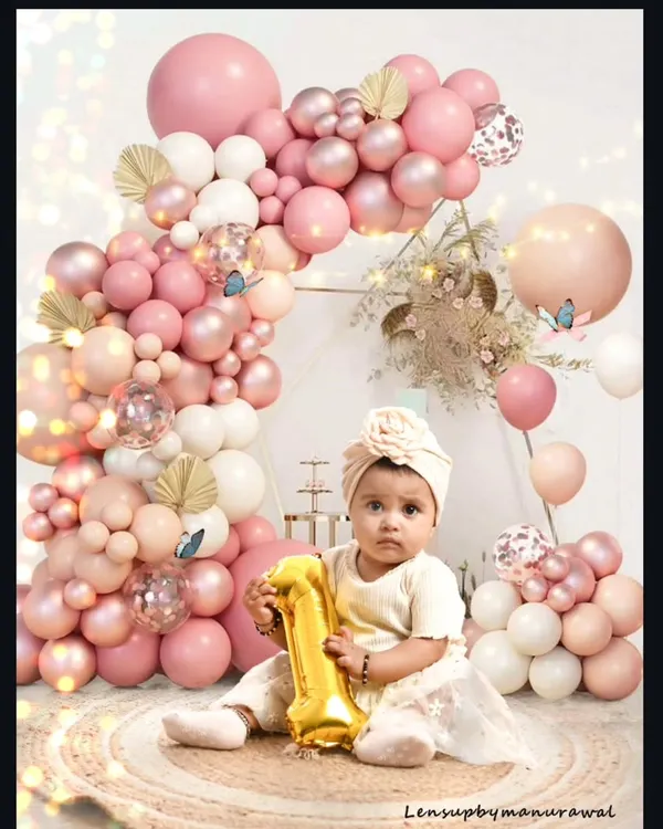 Turning one is a huge milestone worth celebrating in style. This first birthday session features a beautiful balloon arch and a happy baby, showcasing how I create fun, elegant, and memorable setups to mark their special day.