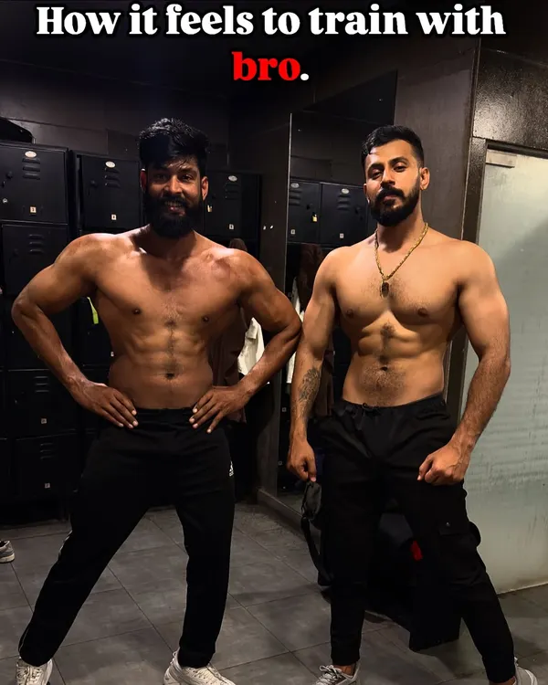 "How it feels to train with bro." A side-by-side comparison of physiques with my training partner.