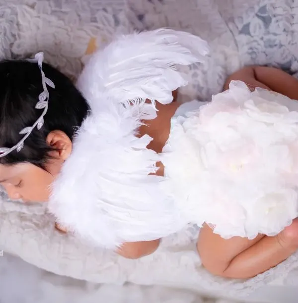 An angel sleeping peacefully. We use soft textures and gentle poses to create heavenly newborn portraits.
