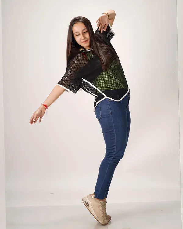 A moment from a dance photoshoot. I believe your vibe and attitude speak through your movement.