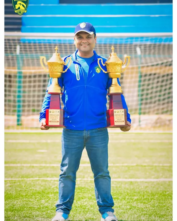 Our coach proudly holding the runners-up trophies for the U-9 and U-11 teams from the WSM League 2024. A fantastic achievement for our young squads.