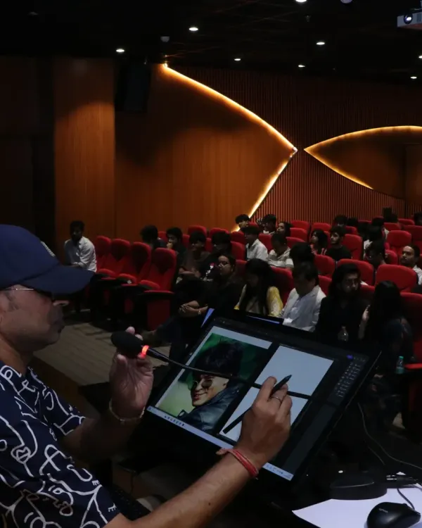 Here I am, doing a live digital caricature demonstration at AAFT for their new students. The process is projected onto a large screen, turning the art into a performance that everyone can watch and enjoy. This is a fantastic way to engage a large audience at corporate events or college festivals.
