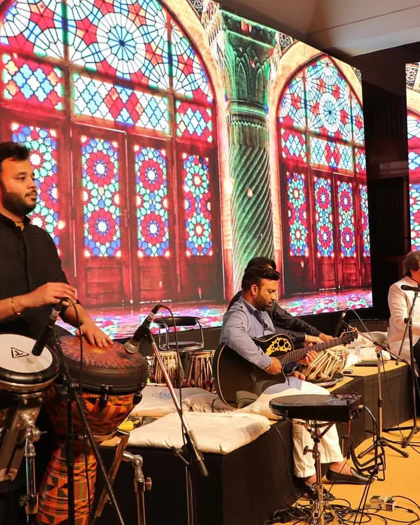 On stage for a ghazal evening with the legendary Talat Aziz ji. My setup includes the Darbuka and Djembe to provide subtle, intricate rhythms for this classic genre.