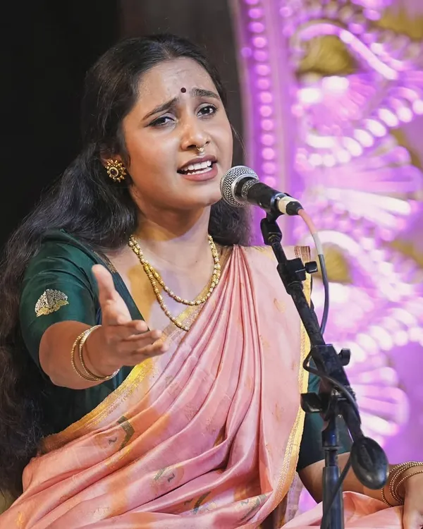 Lost in the melody during a performance at the Bengaluru Ganesh Utsava. These are the moments I live for, connecting with the audience through the power of a song.