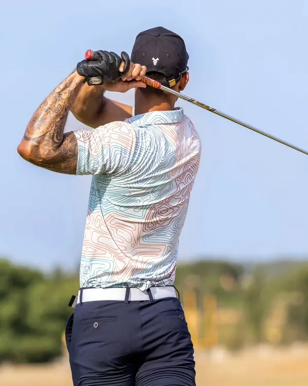 A perfect follow-through captured at our academy. We train golfers to achieve a full, balanced finish, which is crucial for generating power and accuracy in every shot.