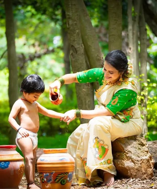 We love bringing unique concepts to life, like this beautiful 'naughty Krishna' themed outdoor session. This portrait captures a tender moment between mother and son, set against a lush, natural backdrop in Bangalore, showcasing our ability to create timeless, story-driven photographs for your family.