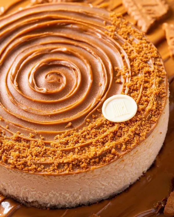 A close-up shot of a Biscoff cheesecake from House of Amel. We focused on the perfect swirl and crumbly texture to create a truly mouthwatering image.