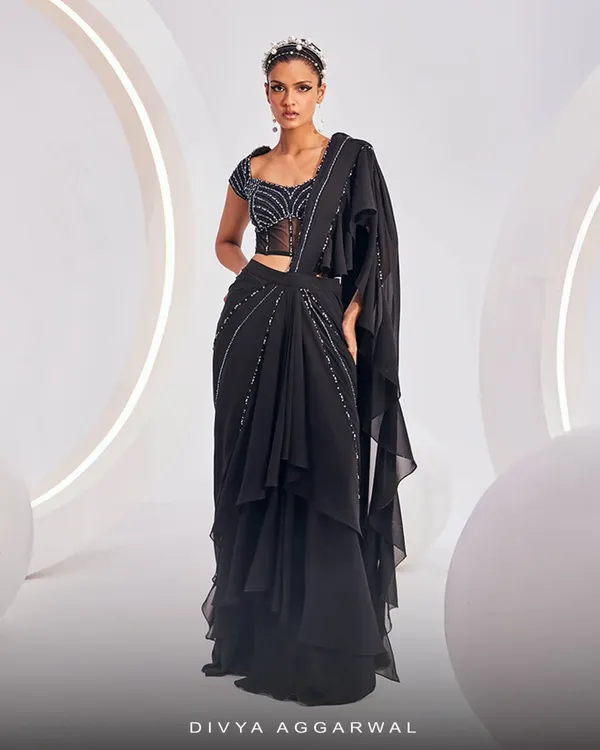 The Nerio Saree Set, a perfect example of contemporary cocktail dressing with its pre-draped silhouette and embellished blouse.