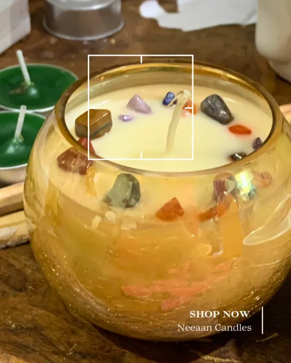 This candle glows with the energy of healing crystals. I hand-poured it in a beautiful golden iridescent jar and embedded it with different stones to radiate positive, calming energy.
