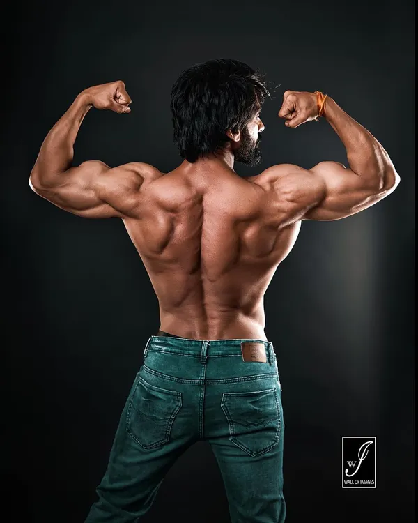 This is what peak conditioning looks like. I used precise studio lighting to carve out every detail of the back muscles, creating a powerful and classic bodybuilding portrait that speaks volumes about dedication.