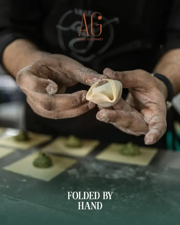 Folded by hand, with heart. Our tortellini is crafted with care and precision, ensuring each one melts in your mouth. Come taste the craft.