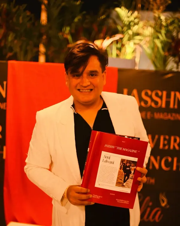 Holding a copy of Jasshn The E-Magazine, which featured a beautiful article about my work. I'm truly blessed and grateful for the feature.