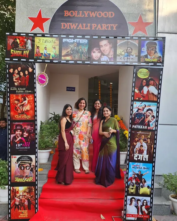 I love bringing big themes to life, and this Bollywood Diwali Party was a blast to create. We set up a grand entrance with a red carpet and a custom movie poster arch, making every employee feel like a star as they walked in.