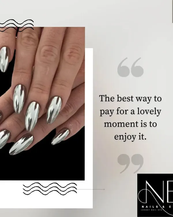 These full-coverage silver chrome nails are the definition of futuristic chic. The liquid-metal effect on long, almond-shaped nails creates a stunning, reflective surface.