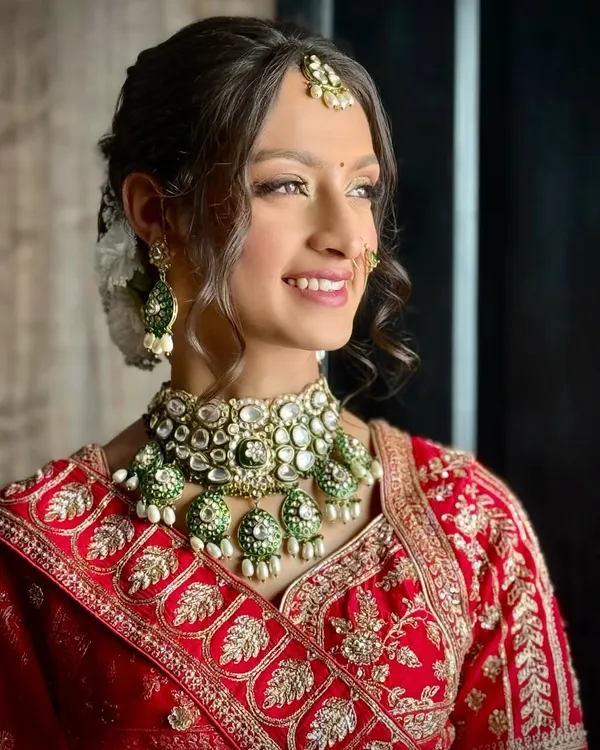 This is my signature soft glam bridal makeup. I focus on creating a radiant, dewy complexion with beautifully defined eyes and a natural lip color, ensuring you look timeless and feel like the best version of yourself.