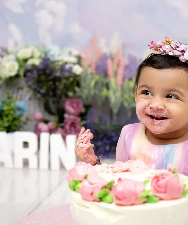 Nothing says "happy first birthday" like a messy cake smash. We capture the pure joy and delightful chaos as your baby dives into their first cake, creating fun-filled memories in a beautiful, pastel-themed setting.