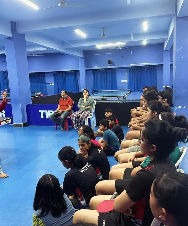 A sports psychology expert leads a session with our paddlers. We provide these workshops to equip our athletes with mental strategies for competition.