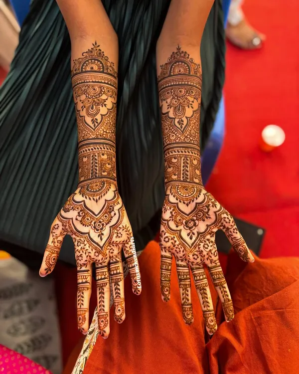 This is the level of intricate detail and artistry we bring to every bridal mehendi. This full-hand design features traditional Indian motifs, perfectly balanced for a stunning bridal look.