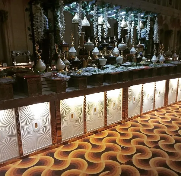 For large scale events like weddings and corporate functions, we create stunning, illuminated counter setups that make the food display a true centerpiece.