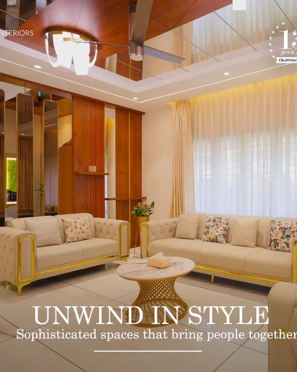 Unwind in style in this sophisticated living room. The design uses mirrors and reflective surfaces to create a sense of spaciousness, while the plush sofas with gold accents add a touch of glamour.