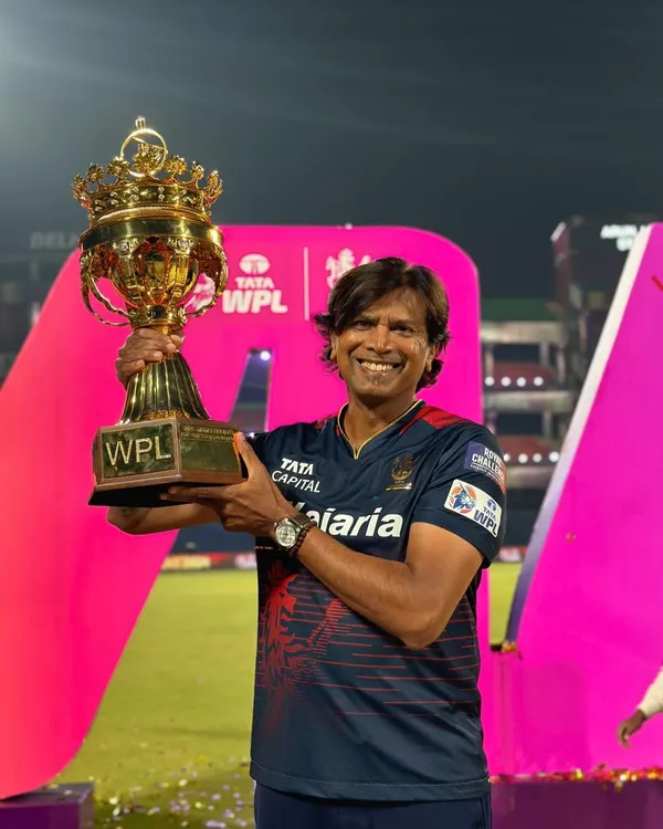 Holding the WPL 2024 trophy with RCB. A proud moment that reflects the entire team's dedication. Ee Sala Cup Namdu!