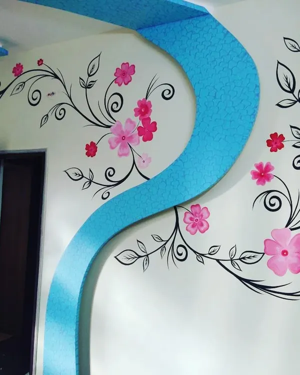 A beautiful floral vine mural painted along a curved ceiling arch. This type of decorative wall art adds a soft, organic touch to home interiors.
