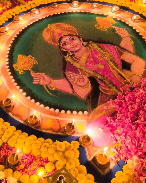 This is an example of a Durga Deepa Namaskara pooja, one of my specialities. The centerpiece is an intricate rangoli of the Goddess, surrounded by dozens of diyas that create a divine and powerful atmosphere in the evening.