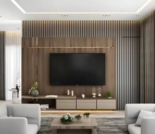 A modern living room featuring a floor-to-ceiling slatted wood panel wall, a low-profile media console, and minimalist white sofas, creating a clean and sophisticated entertainment space.