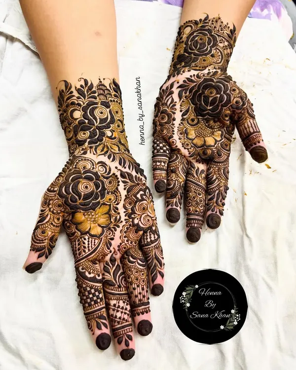 This is one of my signature intricate floral designs, perfect for a bride or for making a statement at any grand celebration. I love layering fine lines, detailed shading, and bold rose motifs to create a rich, full-coverage look that is both traditional and timeless.