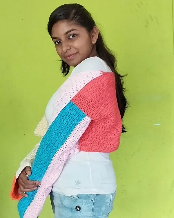 Modeling my multicolored pastel cardigan. This piece is so fun to make and wear, with its unique color-block design and cozy feel.