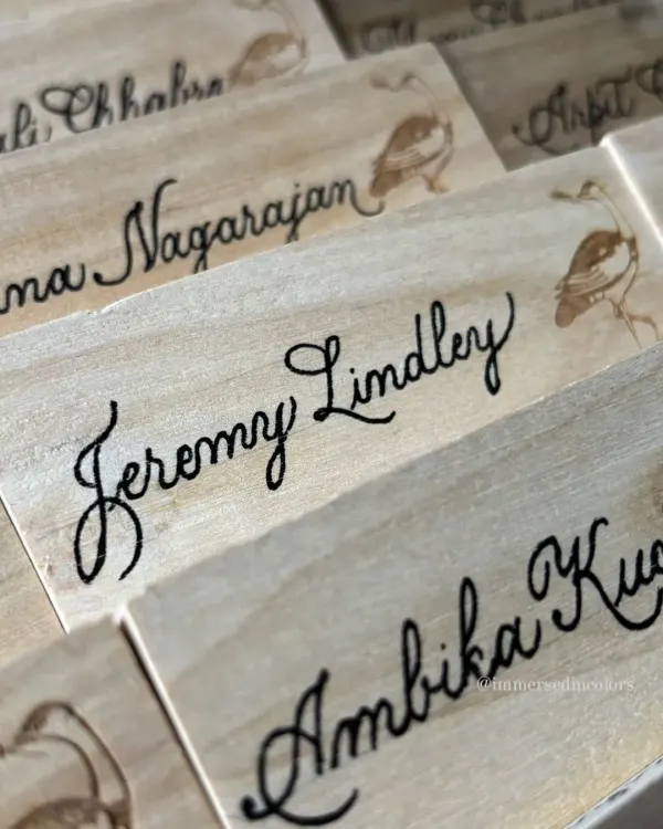A detailed look at the elegant script on a wooden block for Diageo's Godawan. The texture of the wood required a steady hand and specialized technique to achieve this clean, engraved look.