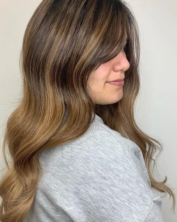 The final result of a beautiful Sandy Balayage. This technique creates a soft, multi-dimensional, sun-kissed effect that looks effortlessly natural.