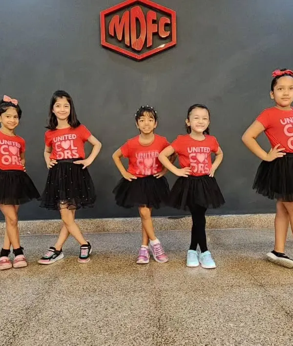 Our summer camp students are ready to take the stage. I provide professional training in a fun environment, and we always end the camp with a showcase where the kids get to perform in cool costumes.