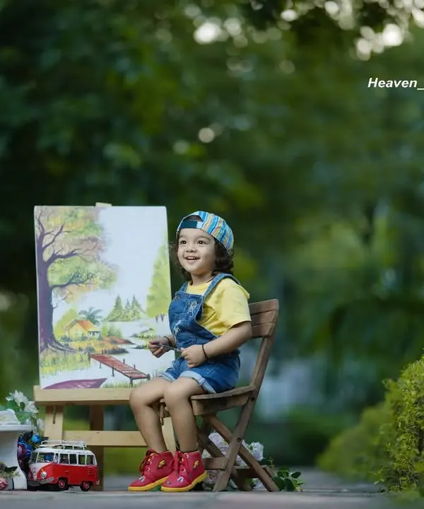 Dream big, little star. This outdoor 'Little Artist' setup, complete with an easel and paints, is a creative way to capture your child's imagination.