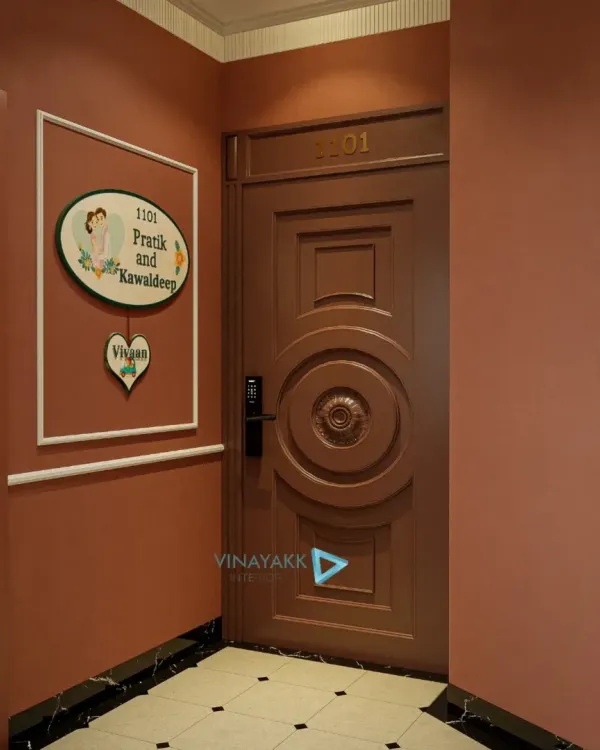 A personalized entrance makes a house feel like a home. This custom nameplate is the first thing you see, set against a warm, dusty rose wall that creates an inviting and personal welcome.